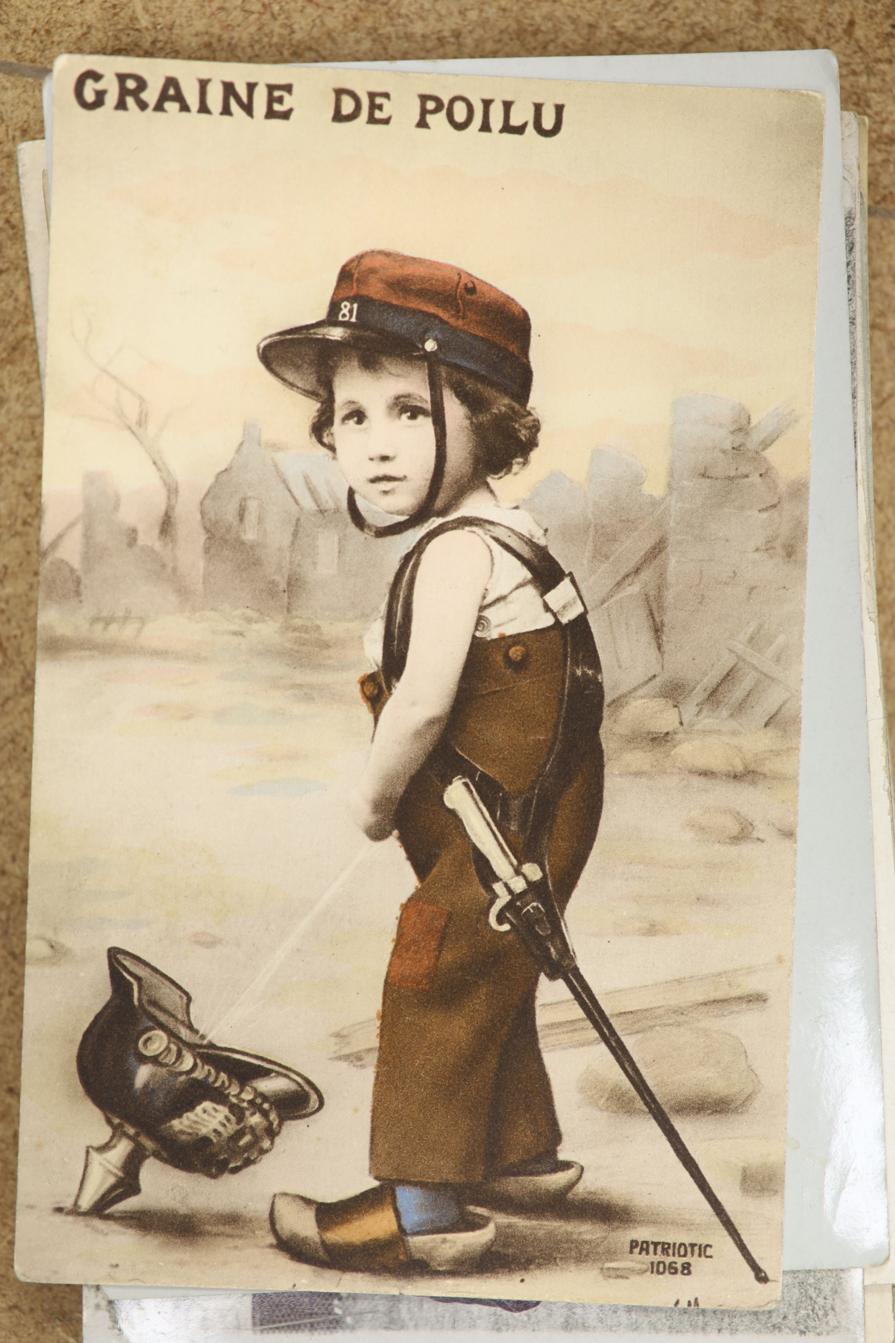 Three albums of photographs and a quantity of postcards inc. erotica.